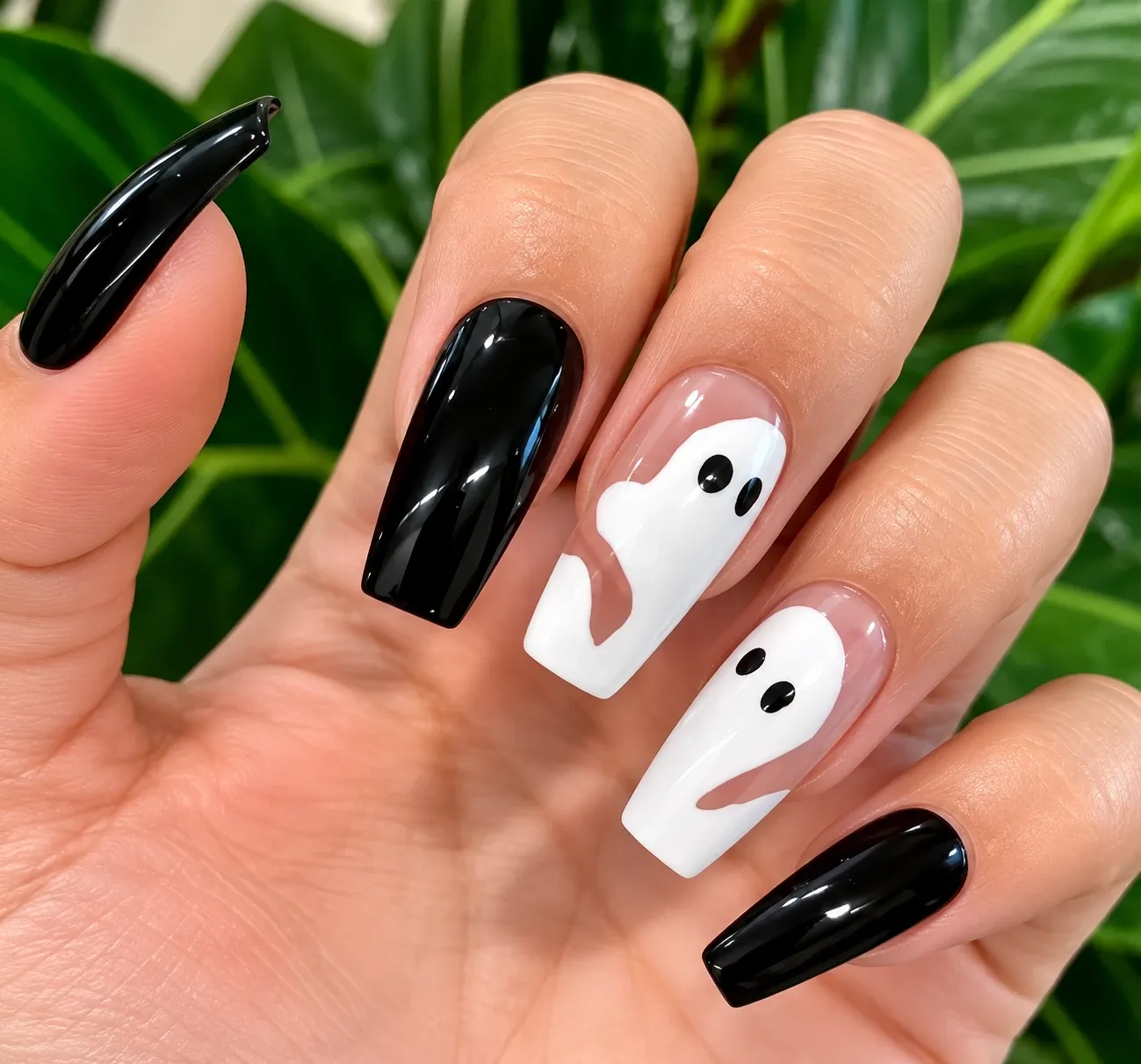 Tiny ghost French tip nails on a sheer base