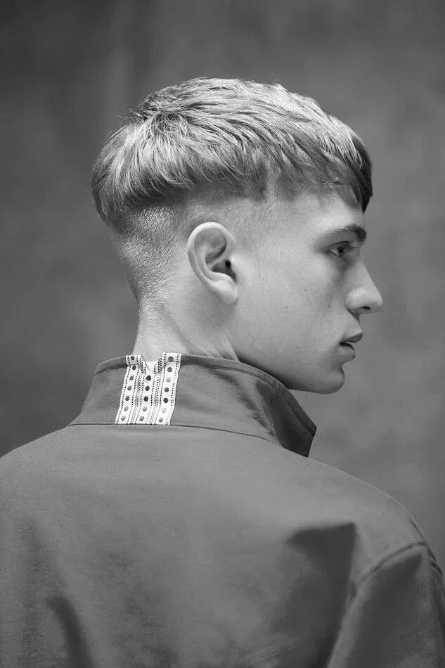 Modern men's bowl cut with textured fringe