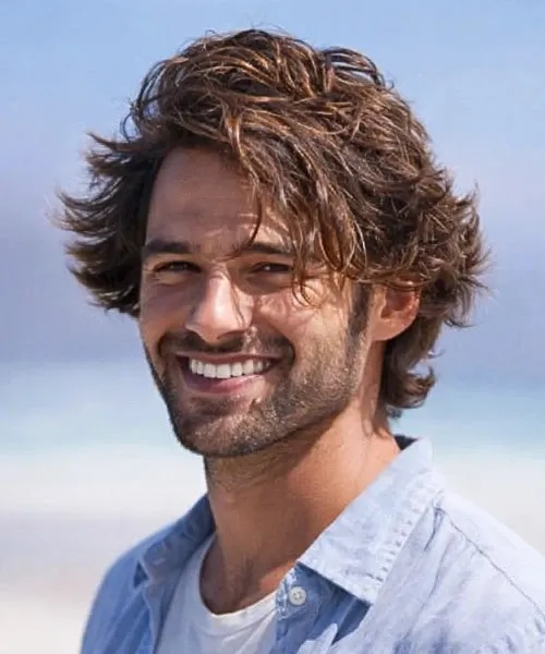 Man with long naturally wavy hair