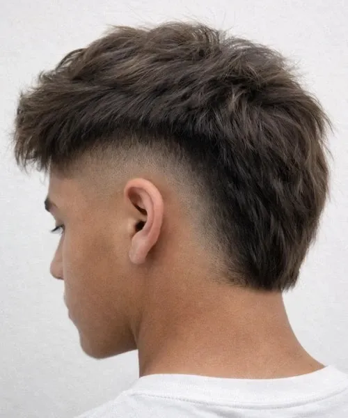 Men's soft mullet haircut with natural texture