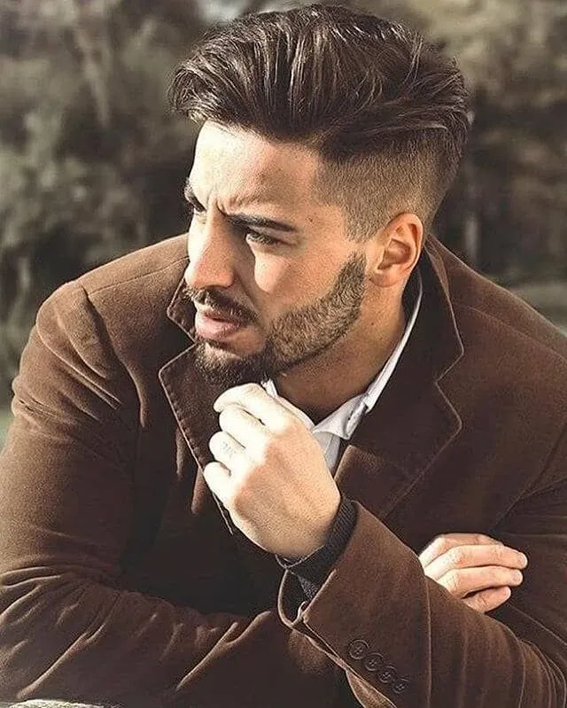 Men's disconnected undercut with longer textured hair on top